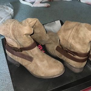 Brown boots with buckles